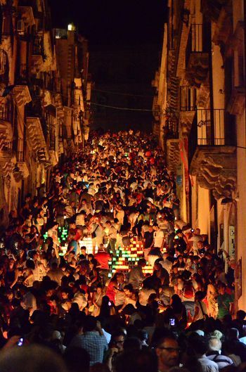 High Angle View Of Crowd On Street At Caltagirone During Night Italy In October, Italian Festival, Christmas Abbott, Village Festival, Full Calendar, Italy Destinations, Christmas In Italy, Italy Honeymoon, Adventure World