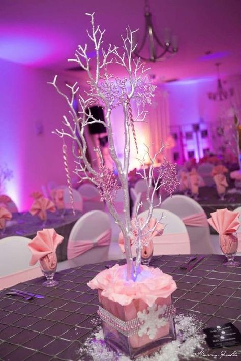 Centerpieces at a winter wonderland birthday party! See more party planning ideas at CatchMyParty.com! Winterland Quinceanera Centerpieces, Winter Wonderland Party Pink And Silver, Pink Winter Wonderland Party Centerpieces, Pink Winter Wonderland Sweet 16, Pink Winter Wonderland Party Sweet 16, Pink Wonderland Party, Pink Winter Wonderland Quinceanera Theme, Pink And White Winter Wonderland, Pink Winter Wonderland Centerpieces