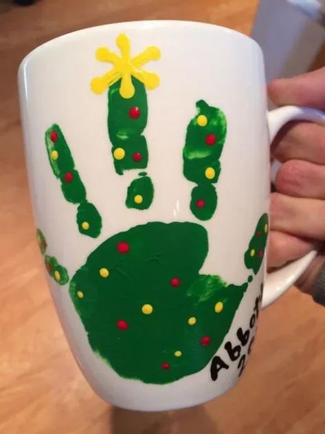 50+ Adorable DIY Christmas Gifts for Grandparents To Melt Their Hearts | HubPages Infant Holiday Gifts For Parents, Handprint Gifts For Grandparents Christmas, Christmas Crafts To Give Parents, Infant Keepsake Ideas, Handprint Christmas Gifts For Parents, Christmas Mug Crafts For Kids, Baby Christmas Gifts For Parents, Gifts For Parents From Kids Christmas, Christmas Handprint Mug