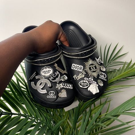 Bling Customisation x Bling Crocs✨🔳 Did you know we offer bling customisations? You can add bling on your straps, or on the crocs in different styles! Contact us today for your bling customisations 📩 #blackcrocs #sayitwithchxrm #fyp #customisations #blingcrocs #uk #christmasgift #giftideas #croccharms #crocsok #crocshoes #shoeporn #shopsmall #shoesaddict #monochrome #black #designercharms #designercrocs #blackandwhite #unisex Designer Crocs, Bling Crocs, Black Crocs, Croc Charms, Crocs Shoes, Different Styles, Did You Know, Burberry, Prada