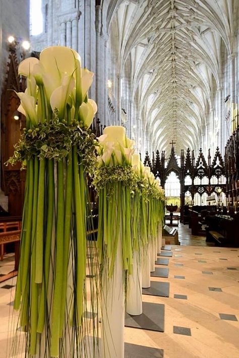 Calla Lily Wedding Flowers, Church Aisle, Winchester Cathedral, Red Amaryllis, Church Wedding Decorations, Church Flower Arrangements, Church Flowers, Modern Flower Arrangements, Bride Magazine