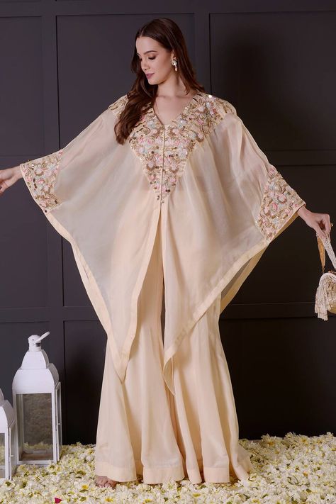 Surabhi Arya's Ivory Jacket Organza Hand Embroidered Cape Set for Women Organza Cape Jacket, Organza Kurti Designs Latest, Kaftan Wedding Dress, Organza Cape, Diwali 2024, Pret Wear, Organza Jacket, Cape Set, Embroidered Cape