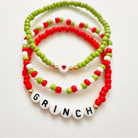 Bracelets are sold separately or as a set Personalization available Grinch Beaded Bracelet, Christmas Themed Bracelets, Christmas Bead Jewelry, Grinch Bracelet, Christmas Bead Bracelet Ideas, Diy Christmas Jewelry Ideas, Bracelets Christmas, Beaded Christmas Bracelets, Diy Christmas Bracelets