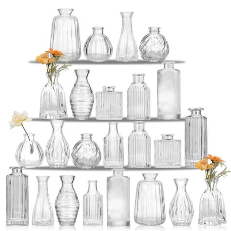 PRICES MAY VARY. [Centerpiece Decor Vases] Each set contains 24 glass bud vases of different shapes, the embossed printing texture is clear, every detail of each product is carefully designed, different heights and shapes make this series look unique and exquisite, to meet any of your decorative needs in any environment. [High-quality Glass] The glass bud vase is made of high-quality glass, with three-dimensional carving, the bottle body is transparent, durable and not easy to break, the bottle Wedding Decorations Vintage, Vases For Centerpieces, Glass Vases Centerpieces, Vases For Flowers, Vase Transparent, Rustic Wedding Decorations, Small Vases, Glass Bud Vase, Transparent Flowers