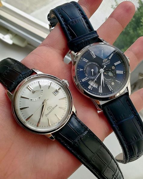 A duo of Orients a few years old that really represents how well the brand innovates in delivering refined, classic-looking designs that are often amiss from other affordable watch brands. The Orient Star Classic (left) is probably my "dressiest" watch thanks to its simplicity and sleekness. The Sun and Moon (right) is a slightly more casual piece, thanks to its slightly larger, more modern dimensions, that still dresses up well for a Saturday night out, or a date night with a special someone Orient Sun And Moon, Orient Star Watch, Orient Watch Men, Orient Bambino, Orient Watch, The Sun And Moon, Star Watch, Affordable Watches, Rita Hayworth