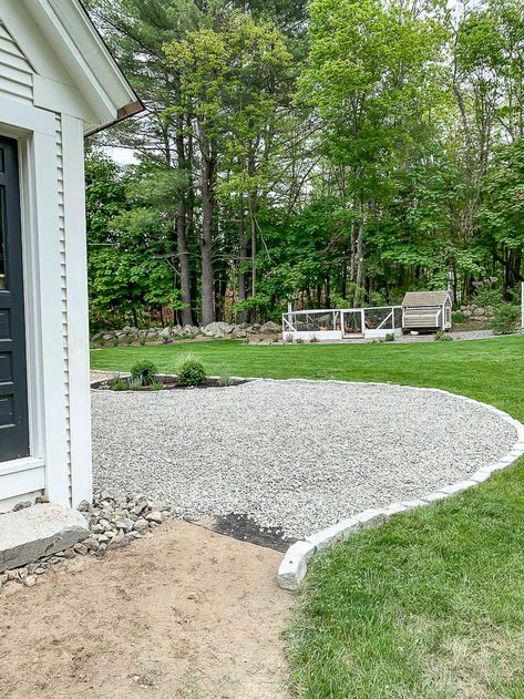 I'm so excited to share this project with you today. How we installed   the gravel patio around our fire pit area. New gravel patio area next to   the house. I included a full budget breakout. New Gravel Patio - Rooms   For Rent blog #newpatio #gravelpatio #homedesign #installation   #budgetbreakdown #blogpost #homeimprovement Pea Pebble Patio Backyard Ideas, River Rock And Pea Gravel Landscaping, Beautiful Pea Gravel Patios, Peastone Patio Ideas, Gravel Patio Ideas Budget, Stone And Gravel Patio, Garden White Stones, Stone Outdoor Flooring, Stone Garden Design