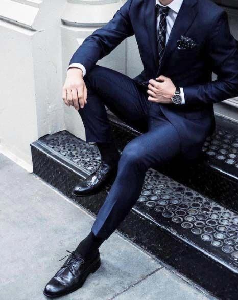 Fall Is Dark Blue Suit Season. Do It Right This Year, Gentlemen. – MANNER Blue Suit Black Shoes, Dark Navy Suit, Mens Wingtip Shoes, Gents Suits, Men Suits Blue, Dark Blue Suit, A Man In A Suit, Man In A Suit, Wingtip Shoes