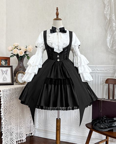 It's the season of little witches everywhere! 🧙‍♀️ New black witch JSK paired with a white princess-sleeved bib blouse—only $99.50! Search "XDJ-154" on devilinspired.com to shop now! 🎃 #witchseason #witchlolita #lolitafashion #spookyvibes #jumperskirt #lolitajsk Gothic Skirts, Witch Dress, Bell Sleeve Shirt, Long Bell Sleeves, Character Inspo, Princess Outfits, Set Up, Dress Set, Lolita Dress