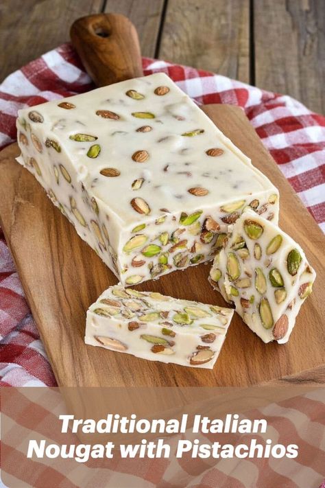 Classic Italian soft nougat with honey, almonds, and pistachios, a traditional holiday torrone candy. Italian Fudge Roll, Italian Nugget Candy, Nougat Bars Recipe, Christmas Nougat Recipe, Pistachio Truffles Recipe, Traditional Italian Christmas Cookies Recipes, Traditional Italian Christmas Recipes, French Nougat Recipe, Torrone Recipe Italian