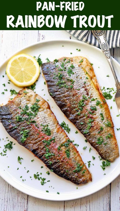 Two fillets of rainbow trout served on a white plate with a slice of lemon. Pan Fried Rainbow Trout, Cooking Rainbow Trout, Rainbow Trout Recipe Pan Fried, Whole Trout Recipes, Trout Fillet Recipes, Rainbow Trout Recipe, Fried Trout, Pan Fried Trout, Fish Batter