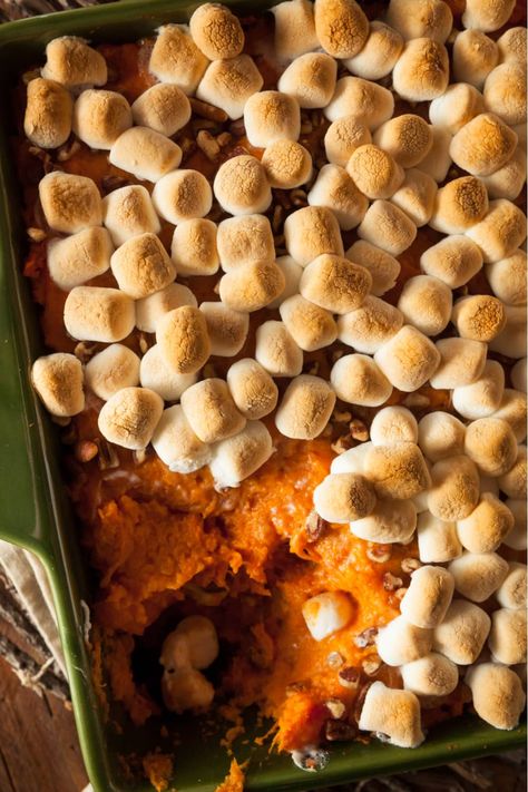 Be it Thanksgiving or Christmas, no holiday is complete without this Paula Deen sweet potato casserole! Make it once, and you'll never look back. Paula Deen Sweet Potato Casserole, Sweet Potato Casserole With Marshmallows, Canned Yams, Sweet Potato Recipes Casserole, Potatoe Casserole Recipes, Thanksgiving Feast, Paula Deen, Toasted Pecans, Mashed Sweet Potatoes