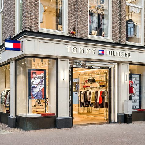 Tommy Hilfiger Aesthetic, Nike Retail, Tommy Hilfiger Shop, Store Shelves Design, Retail Facade, Commercial Design Exterior, Shop Facade, Tommy Hilfiger Store, Aesthetic Stores