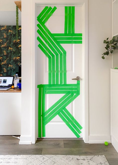 Painters tape on my door to tape up my design before I started building my DIY Barn Door Diy Door Design, Geometric Door, Saw Jigsaw, Custom Carpentry, Diy Interior Doors, Southwest Living, Chevron Door, Mitre Saw, Doors Ideas