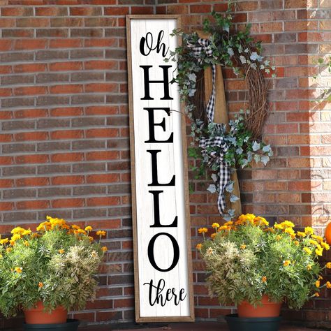 PRICES MAY VARY. 【Superior Quality】: porch board hanging welcome sign is made from high-quality wood and printed with weatherproof uv ink that won't peel, fade or crack. can be used indoors or outdoors. 【Ideal Size】: welcome sign measures 45 inches tall, 9 inches wide, 1 inch thick, and weighs 2.5 pounds. can hang or lean it against the yard, entrances, garage, to show your warm welcome to your guests. 【High Quality Craft】: this wooden front porch welcome sign is made of plaid bows, artificial e Oh Hello Sign, Porch Sign Ideas, Black Wall Hooks, Welcome Porch Sign, Big Wall Decor, Outdoor Welcome Sign, Cheap Farmhouse Decor, Farmhouse Decor Kitchen, Letter Wall Art