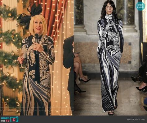 Moira’s astrology print long dress on Schitt’s Creek.  Outfit Details: https://wornontv.net/120049/ #SchittsCreek Moria Rose Outfits, Moira Rose Outfits, Moria Rose, Beetlejuice Musical, Moira Rose, Catherine O'hara, David Rose, Print Long Dress, Schitt's Creek