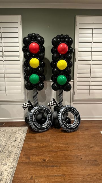 Victoria Dzierza on Instagram: "🚦 TRAFFIC LIGHT COLUMN 🚦

These traffic light balloon columns were a win for this race car-themed birthday party! I kept the traditional bright red, yellow, and green colors for the columns, but added muted colors to the garland for a twist on the primary colors 🏁. 

Want to recreate this look? I’ve posted the full step-by-step tutorial on my subscription page—check it out for all the details!🚦
.
.
.
.
.
.
.
#ballooncolumns #trafficlightparty #racecarparty #boysbirthday #birthdayballoons #themedballoons #balloonartist #balloondesign #ballooninspo #balloonstack #balloonsculpture #balloonstyling #montcopa #buckscountypa #balloonsbyvictoria" Traffic Light Party, Car Themed Parties, Car Birthday Theme, Cars Theme Birthday Party, Bucks County Pa, Race Car Party, Balloon Sculptures, Balloon Columns, Decorations Party