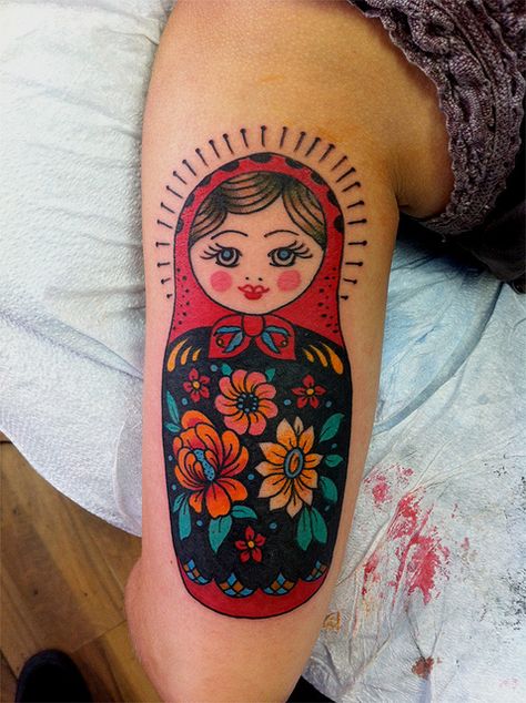 black behind the flowers - would it help to cover up lines??  I like it. Babushka Tattoo, Matryoshka Tattoo, Russian Doll Tattoo, Nesting Doll Tattoo, Mujeres Tattoo, Sister Tattoo Designs, Russian Tattoo, Matching Sister Tattoos, Doll Tattoo