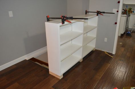 Diy Built In Bookcase Half Wall, Top Of Stairs Bookcase, Stair Railing Shelves, Stair Rail Bookcase, Stair Railing Bookcase Built Ins, Bookcase Railing Half Walls, Bookcase Stair Railing, Railing Bookshelf, Loft Banister Ideas