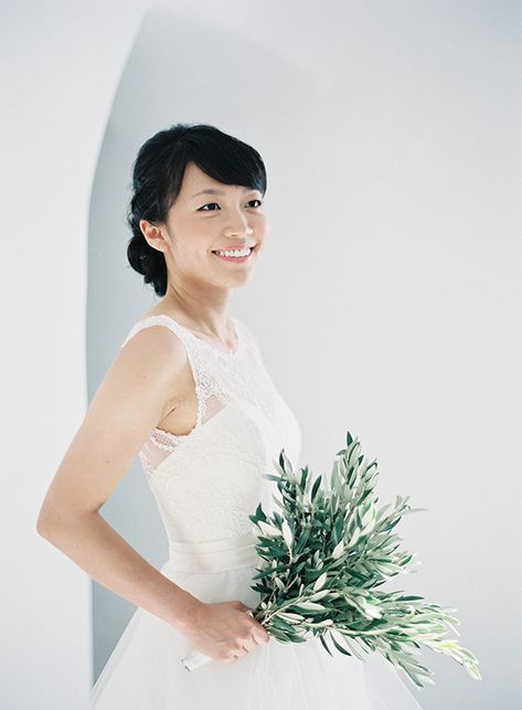 Simple And Stylish Wedding In Santorini via Magnolia Rouge Bouquet Without Flowers, Olive Branch Bouquet, Whimsical Wedding Bouquet, Branch Bouquet, Wild Wedding Bouquet, Tropical Wedding Bouquets, Unique Wedding Bouquet, Fern Wedding, Church Wedding Flowers