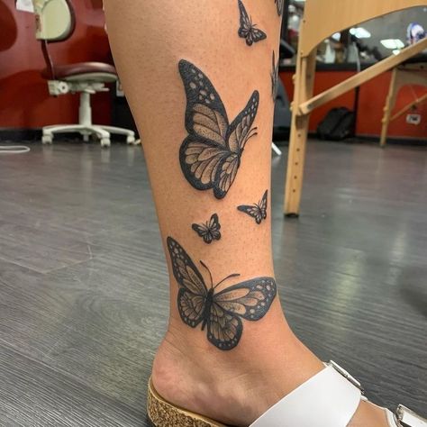 Leg Tattoos Women Lower Calf Butterfly, Butterfly On Calf Tattoo, Butterfly Tattoo Men Leg, Butterfly Tattoo Shin, Butterfly Leg Sleeve Tattoo, Calf Butterfly Tattoo, Butterfly Ankle Tattoo Wrap Around, Butterfly Tattoo On Leg For Women, Butterfly Tattoo Calf