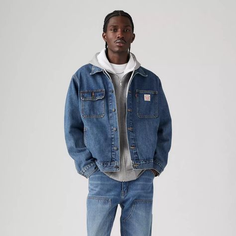 We gave our favorite denim jacket some classic workwear styling in a vintage-inspired fit (for days when you want to step up your denim repertoire). But unlike its predecessor, this Sunrise Trucker Jacket has a relaxed fit in the body for a boxier look.A reinterpretation of the classic Trucker Jacket silhouetteDesigned with a relaxed fit for an effortlessly cool styleSits at your waistCut with more room through the body and shoulder Mens Jean Jacket Outfit, Levis Jacket Outfit, Mens Jean Jacket, Jean Jacket Outfit, Levi Jacket, Jean Jacket Outfits, Levis Denim Jacket, Jean Jacket Men, Levis Jacket