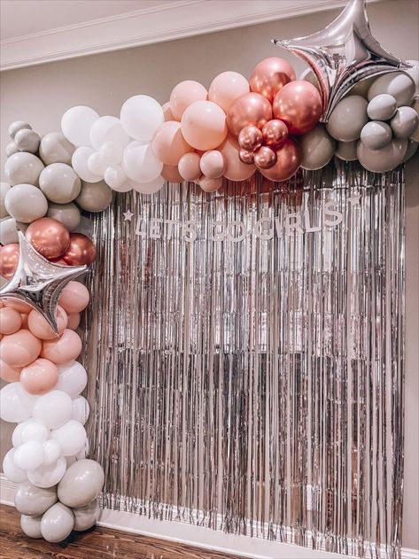 white balloons, silver balloons, sparkle balloons, pink balloons, rose gold balloons, let's go girls sign, silver tassel wall, bachelorette weekend decor, balloon arch on wall to take pictures in front of Women's Day Decoration Ideas, Pink Fringe Backdrop, Bachelorette Party Decor Ideas, Sparkle Bachelorette Party, Pink Streamers, Streamers Party, Pink Birthday Decorations, Streamer Party Decorations, Foil Fringe Curtain