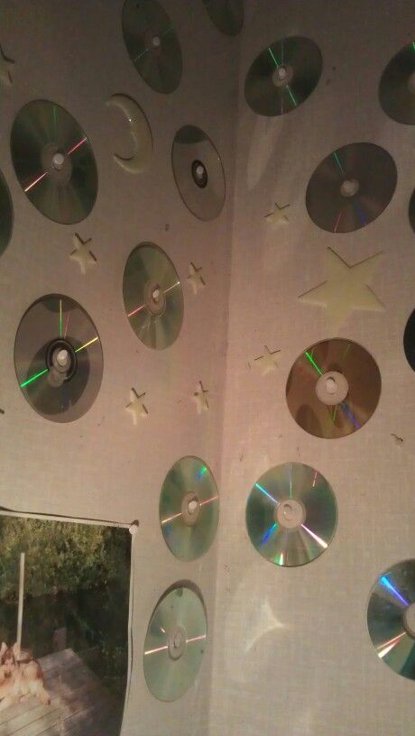 Cd's on the wall Hanging Cds On Wall, Dvd Wall Decor, Cd Decoration Ideas Wall Decor, Cd On Wall, Cd Room Decor Wall Art, Cds On Wall, Cd Room Decor, Cd Wall Decor, Dvd Wall