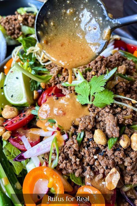 Thai beef salad with peanut dressing. Garnished with fresh veggies, rice noodles, sesame seeds, and extra peanuts Thai Beef Noodle Salad, Beef Noodle Salad, Ginger Peanut Dressing, Peanut Ginger Dressing, Best Salad Dressing, Easy Salad Dressing Recipes, Thai Beef Salad, Salad Dressing Recipes Healthy, Thai Beef