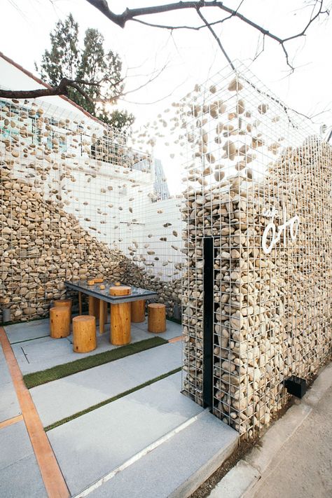 Photo: Design Bono Café Design, Gabion Wall, Retail Design Blog, Design Exterior, Cafe Design, Outdoor Design, Stone Wall, Retail Design, Restaurant Design