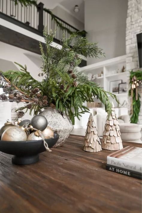 Deck the halls and your Christmas table with a touch of rustic charm! Use our wooden black ribbed fruit bowl to showcase festive tree ornaments, adding a delightful twist to your holiday decor. ✨ Table Decorations Black, Christmas Bowl Decorations, Black Fruit Bowl, Wood Fruit Bowl, Bowl Pedestal, Christmas Coffee Table Decor, Holiday Living Room, Wood Fruit, Wooden Fruit Bowl