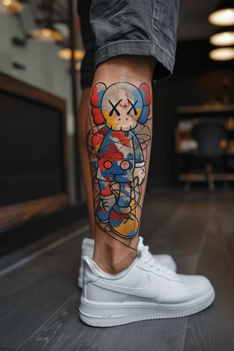 Best KAWS Tattoo Ideas for Bold Designs Klaws Tattoos Ideas, Kaws Tattoo Design, Kaws Tattoo, Neo Tattoo, Pop Art Tattoos, Protection Symbols, Cowgirl Art, Music Tattoo, Leg Tattoo