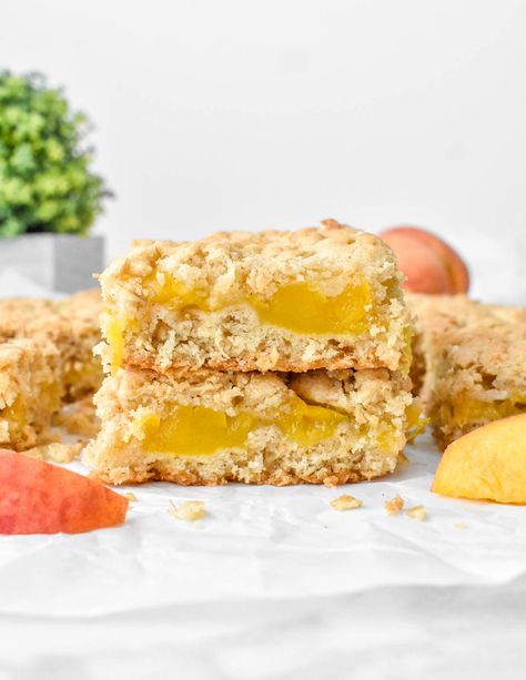 Healthy Peach Crumble Bars - Herbs & Flour Healthy Peach Crumble, Summer Meaning, Peach Cobbler Cinnamon Rolls, Peach Pie Bars, Peach Crumble Bars, Peaches And Cream Dessert, Lemon Blueberry Bars, Portable Dessert, Cinnamon Roll Bake