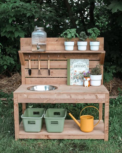 The Mini Potting Station *MUD KITCHEN & POTTING STATION PREORDERS OPEN FRIDAY, MAY 24, 2024 AT 10AM* The Mini Potting Station is a fantastic addition for young gardening enthusiasts. It resembles our standard-sized Potting Station, but was specially designed with toddlers and smaller spaces in mind. Its smaller size allows little ones to comfortably reach and engage in various gardening activities and aims to foster a sense of autonomy as they learn to work independently. The Mini Potting... Garden Potting Station, Backyard Play Spaces, Flower Station, Toddler Garden, Potting Station, Gardening Activities, Outdoor Play Space, Play Area Backyard, Backyard Kids Play Area