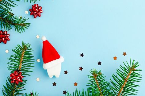 Fir branches, creative toy tooth in red ... | Premium Photo #Freepik #photo #christmas #party #medical #santa Dental Christmas, Red Santa Hat, Medical Dental, Photo Christmas, Premium Photo, Santa Hat, Blue Background, Blue Backgrounds, Christmas Party