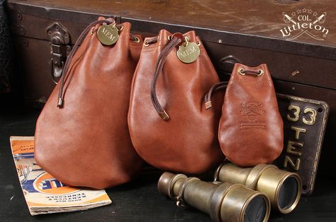 You can pack enough essentials in our Possibles Bags to prepare for most any contingency. Use them for golf outings, coins, travel bags, etc. Handmade in our Workshop of soft, dry-milled leather in vintage brown. Round leather lace drawstring threads through brass eyelets. Copper tabs on drawstring ends. #MadeintheUSA #leathergoods #leatherbags #menswear #mensaccessories #ColLittleton Mens Golf Fashion, Leather Goodies, Leather Pouches, Hip Pouch, Leather Ideas, Diy Camping, Bible Covers, Sewing Leather, Camping Tips