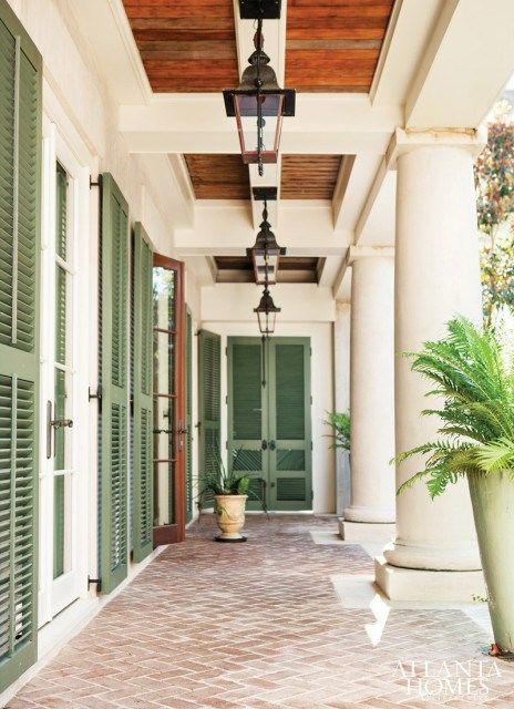 Beach Beautiful | The Potted Boxwood West Indies Style, Green Shutters, British Colonial Style, Shutters Exterior, House Beach, Brick Flooring, Atlanta Homes, Exterior Paint Colors, Colonial Style