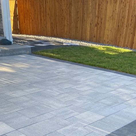 Grey Pavers Backyard, Driveway To Patio Transition, Gray Pavers Patio, Backyard Landscaping Pavers, Grey Pavers Patio, Grey Paver Walkway, Backyard Concrete Patio Designs, Concrete Patio Paver Border, Gray Paver Pool Deck