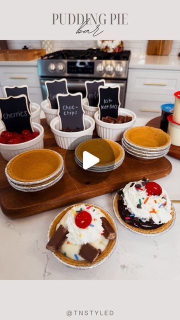 Tara Tedesco | Tnstyled on Instagram: "PUDDING PIE BAR! 

Comment “PIE” and I’ll send you the mini chalk boards I used along with a list of all of the items I used as toppings. 

There are the cutest little dessert! You can also make homemade pudding and serve it in bowls to add to the mini pie crusts. This is perfect for birthday parties too! And who doesn’t like pudding pie?! Been one of my favs since I was a kid! 

#dessertideas #birthdaypartyideas #kidspartyideas #easydessertideas #pudding easy dessert ideas for birthday parties, kids party activity," Mini Pie Dessert Board, Mini Pie Bar Ideas, Dessert Ideas For Birthday, Mini Pie Bar, Easy Dessert Ideas, Mini Pie Crust, Party Activities Kids, Pudding Pie, Pie Party