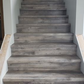 Custom Vinyl Plank Stair Nosing | Free Estimate Metal Stairs, Basement Makeover, Floor Remodel, Stair Nosing, Flooring Store, Vinyl Plank Flooring, Hallway Ideas, Luxury Vinyl Plank, Plank Flooring