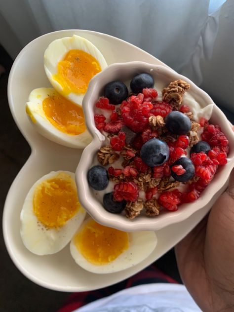 2 soft boiled eggs with a greek yogurt parfait topped with blueberries, raspberries and granola Eggs And Yogurt Breakfast, Soft Boiled Eggs Breakfast Ideas, Greek Yogurt Recipes Breakfast, Greek Yogurt And Fruit, Yogurt Recipes Breakfast, Greek Yogurt Breakfast, Healthy Breakfast Idea, Greek Yogurt Parfait, Meal Box