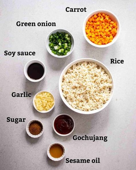 Featuring fluffy rice and veggies tossed in a spicy, savory sauce, this Gochujang fried rice is a crowd-pleaser! This delicious recipe is simple, easy, and ready in 15 minutes. A great way to use up leftover rice! Sauce For Rice And Veggies, Gochujang Fried Rice, Gojuchang Recipe, Korean Fried Rice Recipe, Fried Rice Sauce, Gochujang Rice, Ingredients For Fried Rice, Gochujang Sauce Recipe, Vegan Gochujang