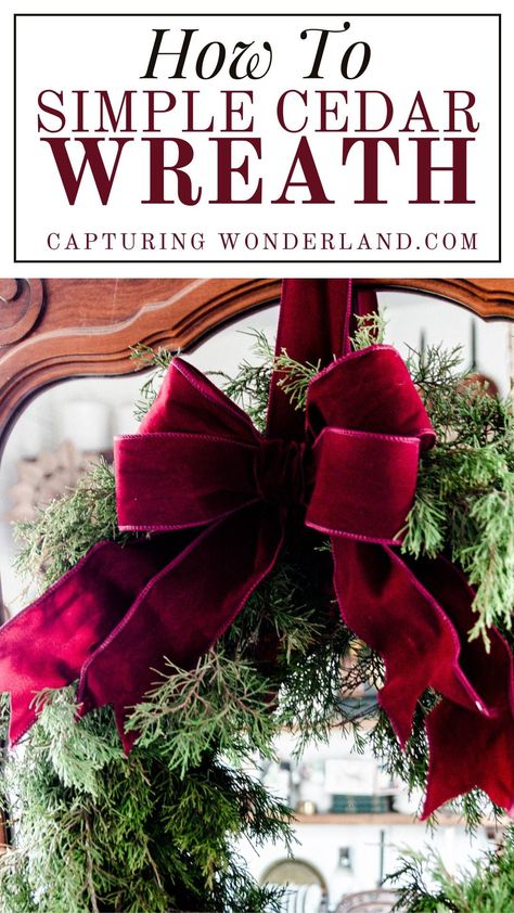 Simple fresh cut cedar wreath with bright burgundy double bow made from velvet ribbon. Cedar Boughs, Fresh Christmas Wreath, Cedar Wreath, Fresh Wreath, Farmhouse Style Wreath, Branches Diy, Easy Christmas Wreaths, Wood Burning Crafts, Christmas Wreaths To Make