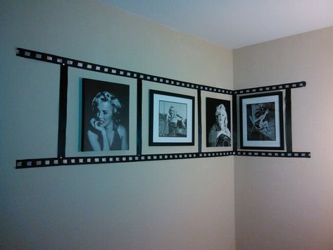 Photo reel collage made with black and white ribbon and a few of my fav Marilyn Monroe picture frames... Gives an amazing look in my living room next to my other collections! Movie Theme Decor Room Ideas, Filmmaker Room Ideas, Marilyn Monroe Living Room Ideas, Marilyn Monroe Aesthetic Bedroom, Cinema Themed Living Room, Movie Themed Living Room Ideas, Hollywood Room Ideas, Marilyn Monroe Room Ideas Bedrooms, Marilyn Monroe Home Decor