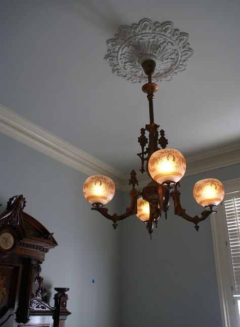 https://flic.kr/p/DiHoaM | The bedroom gas fixture, circa 1875 | Gas fixture maker is unknown. A set of 4 matching flashed amber 2 5/8" fitter gas shades also called cameo lady. Antique Lighting Vintage, Old Light Fixtures, Victorian Light Fixtures, Gas Lighting, Old Houses Renovation, Banquet Lamp, Oyster Fork, Repurposed Lamp, Victorian Lamps