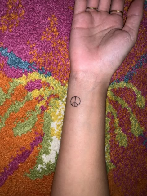 Dainty fine line tattoo Small Peace Sign Tattoo Simple, Dainty Peace Sign Tattoo, Tattoo Ideas Peace Sign, Fine Line Peace Sign Tattoo, Simple Peace Sign Tattoo, Tiny Peace Sign Tattoo, Small Hippy Tattoos, Fine Line Small Tattoo Ideas, Tattoos About Peace