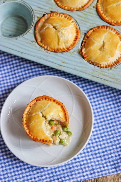 I'm sharing something different for Pi Day: individual pot pies in a muffin tin! These rich and creamy mini chicken pies are SO delicious, and it's easier than you might think to make mini chicken pot pies with pie crust using pre-made dough. Click or visit FabEveryday.com for the full muffin tin chicken pot pie recipe and tips for making chicken pot pies in muffin tins. Once you try these mini pot pies with pie crust, this will be the only muffin tin pot pies recipe that you'll ever need. Chicken Pot Pie Tarts, Chicken Pot Pie Pockets Easy, Homemade Mini Chicken Pot Pie, Mini Shepards Pie Muffins, Mini Veggie Pot Pies, Individual Savory Pies, Miniature Chicken Pot Pies, Chicken Pot Pie Pie Crust Recipe, Mini Pot Pie Recipe