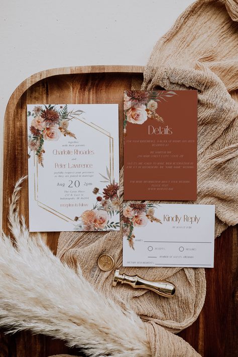 "This listing is for a bohemian terracotta Wedding Invitation Suite Template that features a gold geometric frame and rust colored botanicals. This template set includes an invitation, rsvp card with optional 2nd for use as a postcard and a matching details / accommodations card.  This INSTANT DOWNLOAD will allow you to access your template within minutes of purchase using TEMPLETT, a fully customizable template editor.  This editor will allow you to customize your design almost completely, directly in your web browser without needing to download any special software or fonts.  Add a background or second side, upload a photo, change colors, fonts, sizes and locations of elements to make this design all your own. Edit all wording, fonts and font colors to perfectly match your personal weddi Wedding Invites Terracotta, Wedding Invitations Terracotta, Terracotta Wedding Invitations, Rust Wedding Invitation, Bohemian Terracotta, Fall Wedding Invitation Suite, Boho Wedding Invite, Terracotta Wedding Invitation, Wedding Edit