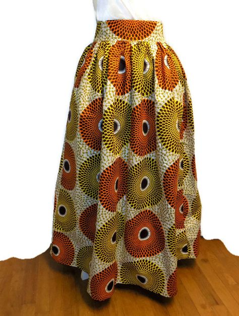 Beautiful Handmade African Maxi Skirt in a gorgeous vibrant Ankara print. This is full, gathered, and lined 42 long maxi skirt with 2-inch high waistband, back zip closure and 2 side seam pockets that work for either day or night. Lining allows more use throughout the year - wear it during Long Gathered Skirt, Skirt African Print, African Maxi Skirt, Maxi Skirt With Pockets, African Skirt, African Print Maxi Skirt, African Print Skirt, African Skirts, African Fashion Skirts