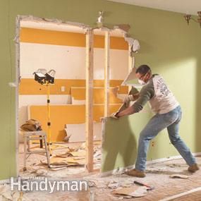 "In this story, we'll show you how to remove nearly any wall and tell you how to add a structural beam if it's needed. It may be scary to think about tearing walls out of your house, but don't be intimidated. You can do it if you've done any basic carpentry work like framing in a wall or building a shed or deck. In fact, removing the wall and replacing it with a beam will only take a half day or less." Load Bearing Beam, Removing A Wall, Wall Removal, Load Bearing Wall, Up House, Family Handyman, Drill Press, Home Repairs, Large Living Room