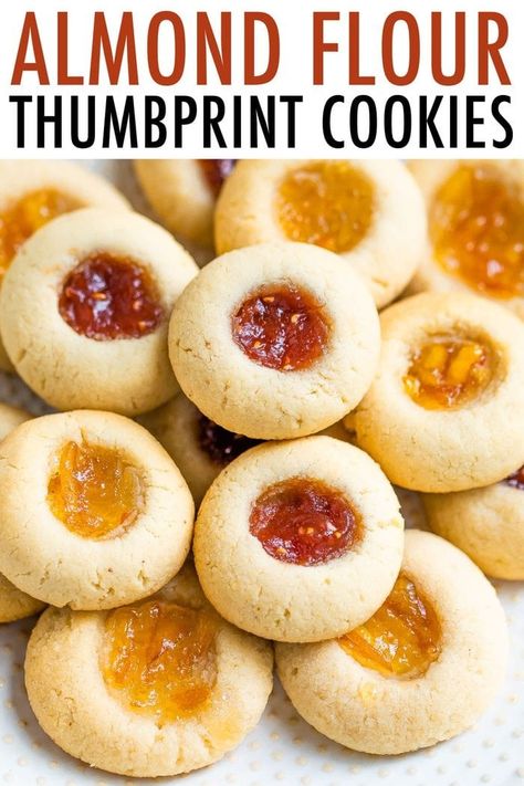 These easy and healthy almond flour thumbprint cookies are made with just six simple ingredients. They're festive and perfect for the holidays. #thumbprintcookies #holidaycookies #christmascookies #vegan #glutenfree #almondflour #eatingbirdfood Almond Flour Cookies Recipes, Gluten Free Cookies Almond Flour, Almond Flour Thumbprint Cookies, Gluten Free Thumbprint Cookies, Homemade Fig Jam, Almond Flour Recipes Cookies, Thumbprint Cookies Recipe, Almond Flour Cookies, No Flour Cookies